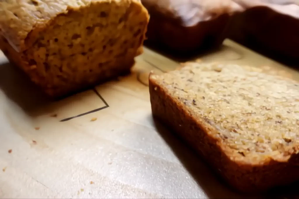 banana-bread-sliced-on-wooden-tray