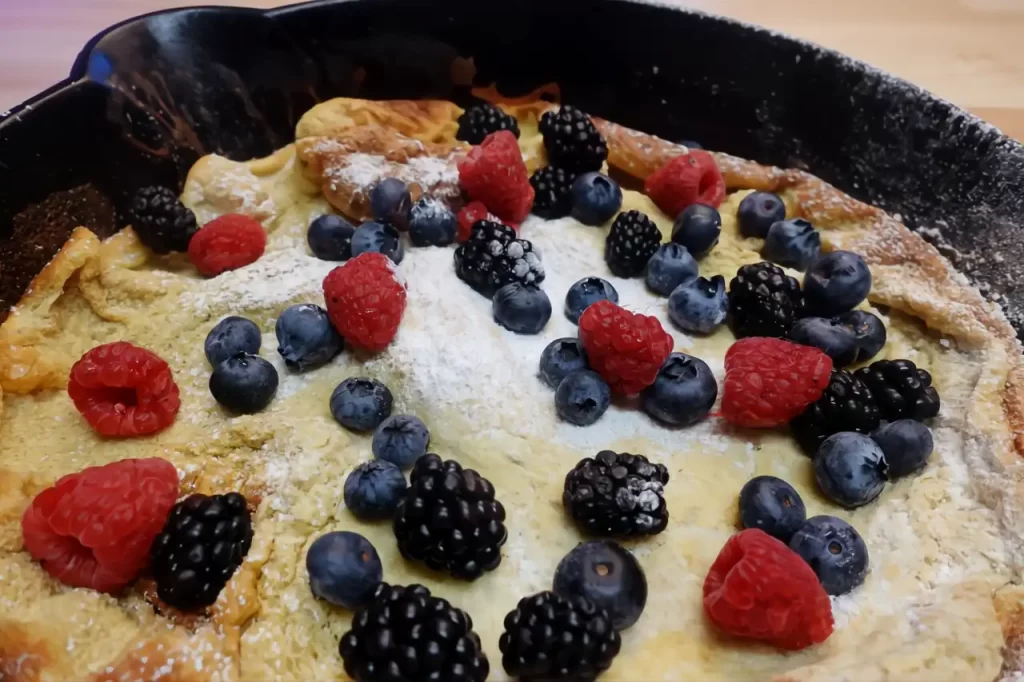 dutch-baby-with-fruit-in-cast-iron-skillet