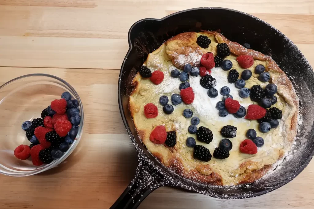 top-view-dutch-baby-with-bowl-of-berries