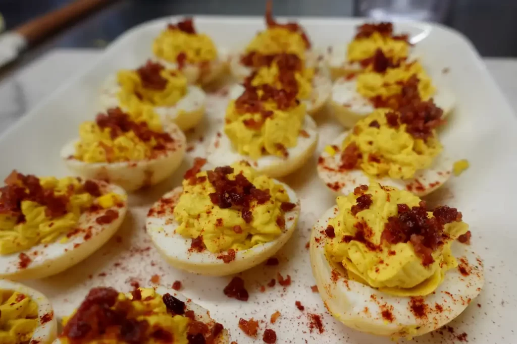 smoked-deviled-eggs-topped-with-bacon