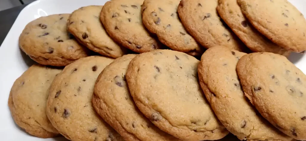 baked-reeses-stuffed-chocolate-chip-cookies-on-tray.
