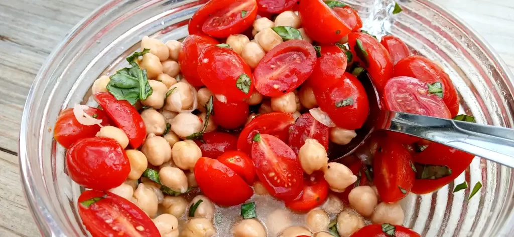 tomato-basil-chickpea-Salad-in-glass-bowl