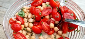 tomato-basil-chickpea-Salad-in-glass-bowl