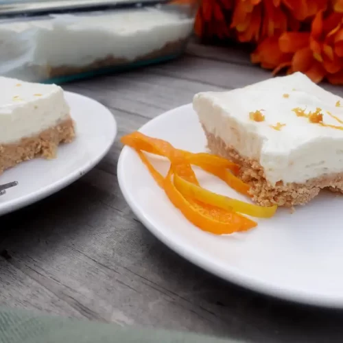 citrus-cheesecake-bars-on-serving-plates