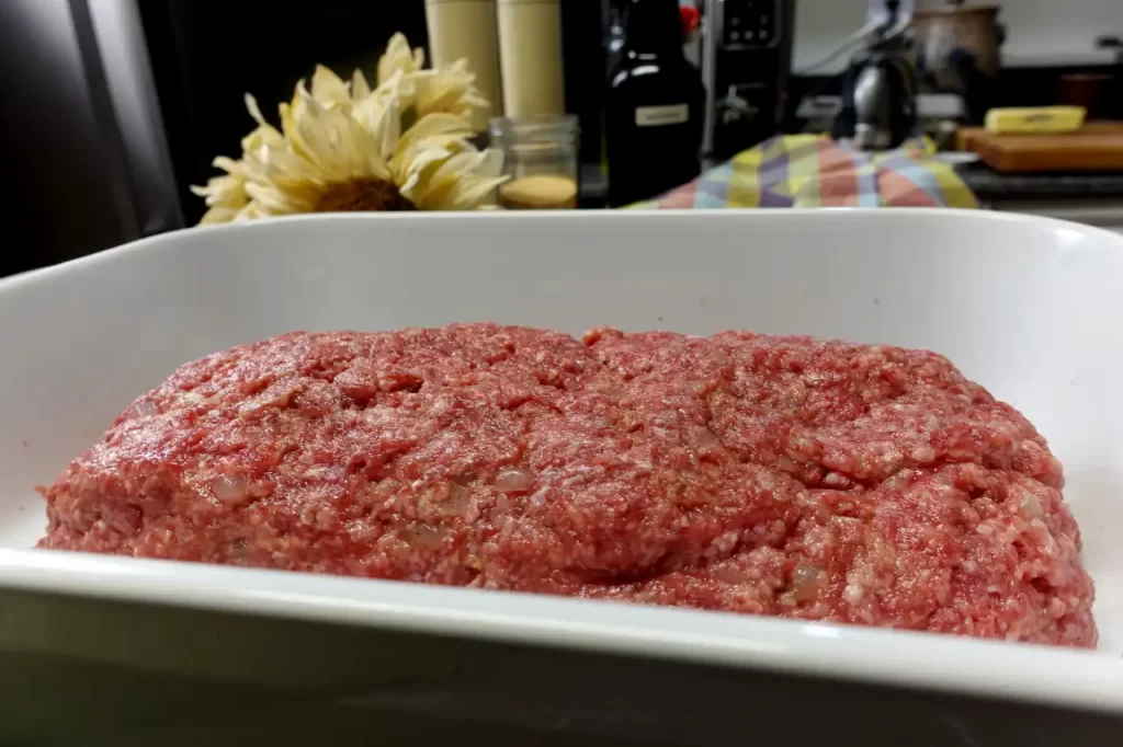 close-of-meatloaf-in-white-baking-dish-not-baked.