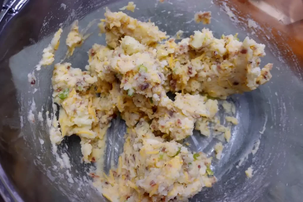 loaded-mashed-potato-cakes-mixed-in-bowl.