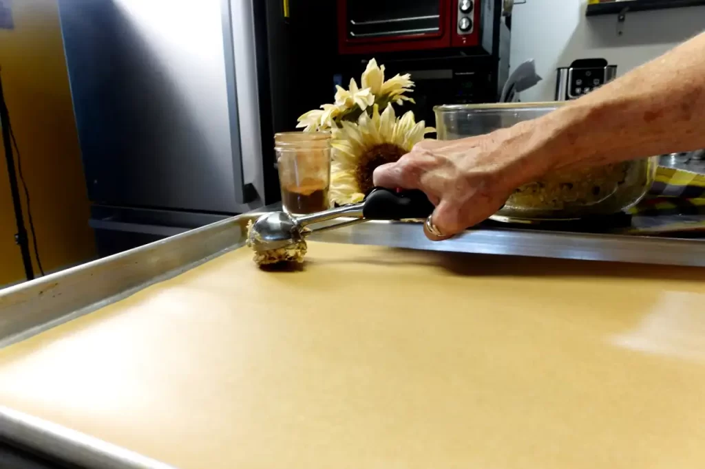 scooping-oatmeal-raisin-cookie-dough.