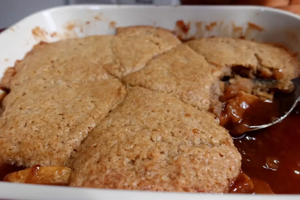scooping-out-maple-caramel-apple-cobbler-recipe