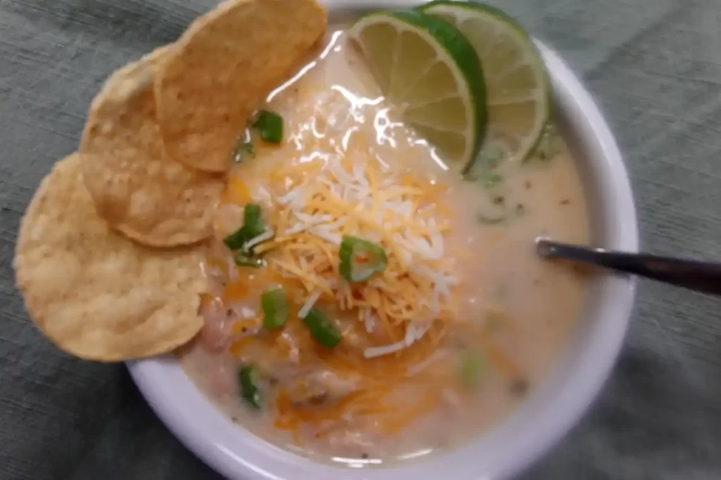 top-view-creamy-white-chicken-chili-with-tortilla-chips
