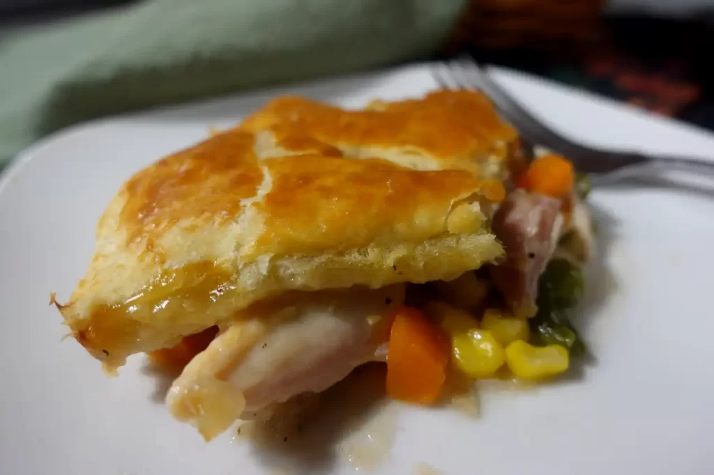 turkey-pot-pie-serving-on-white-plate
