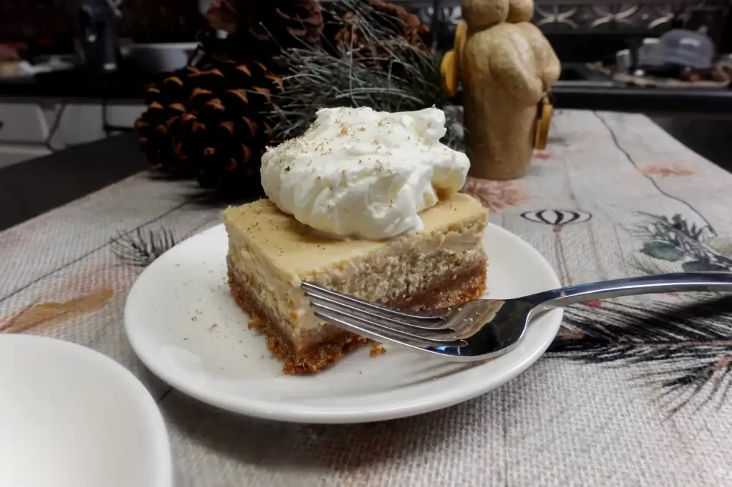 eggnog-cheese-cake-bars-on-serving-plate.