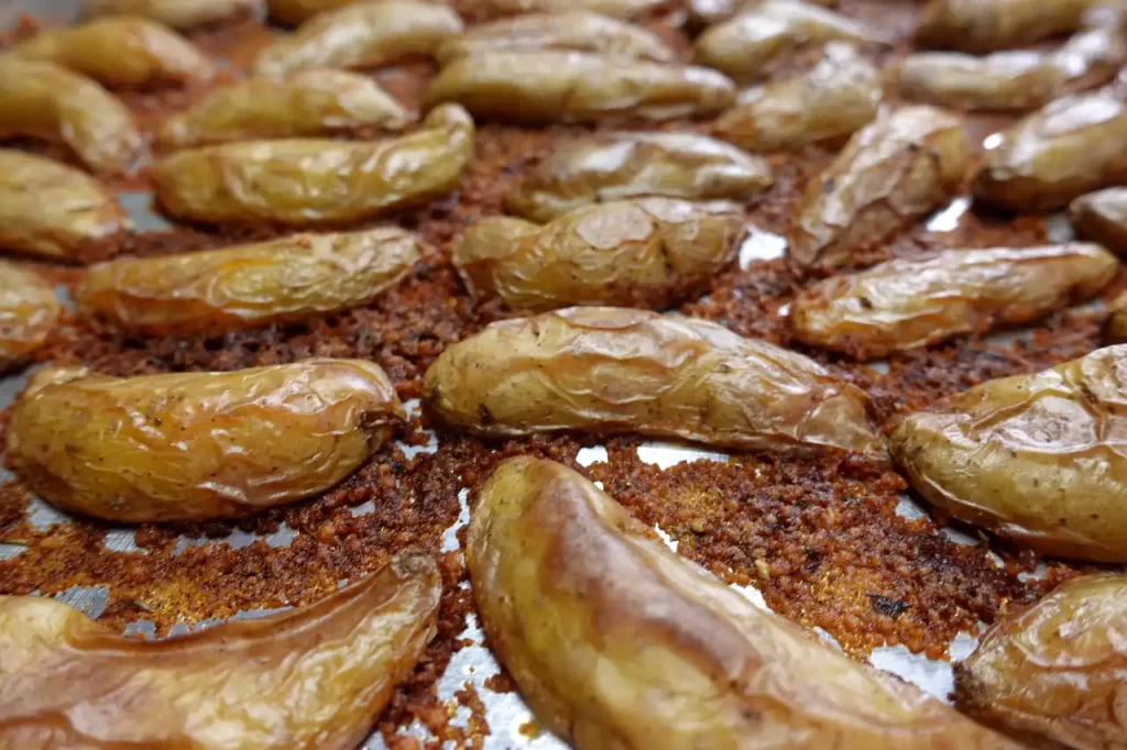 crispy-parmesan-fingerling-potatoes-on-sheet-pan-out-of-oven