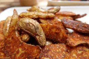 crispy-parmesan-fingerling-potatoes-on-white-platter.