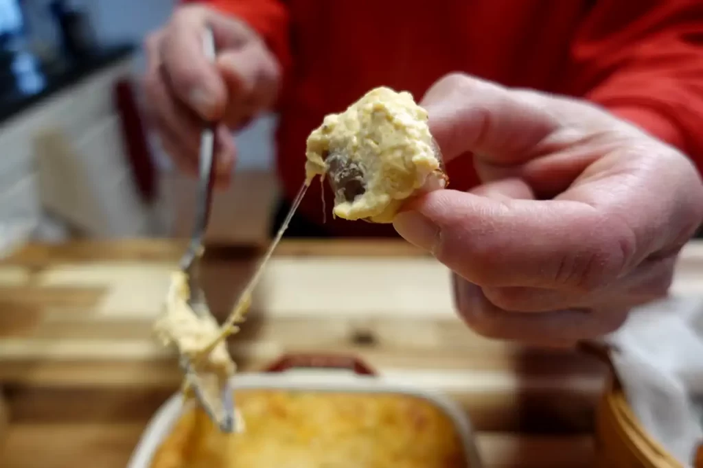 cheesy-hot-crab-dip-on-soft-pretzel-bite.