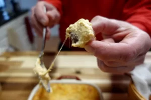 cheesy-hot-crab-dip-on-soft-pretzel-bite.