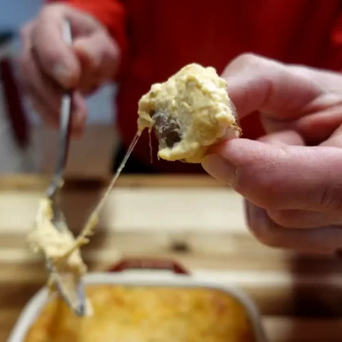 cheesy-hot-crab-dip-on-soft-pretzel-bite.