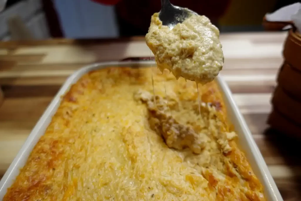 close-up-cheesy-hot-crab-dip-cheese-pull