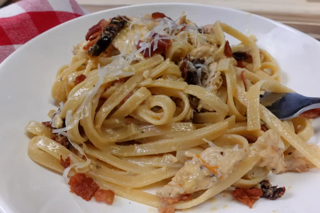 chicken-carbonaro-on-serving-plate-with-fork