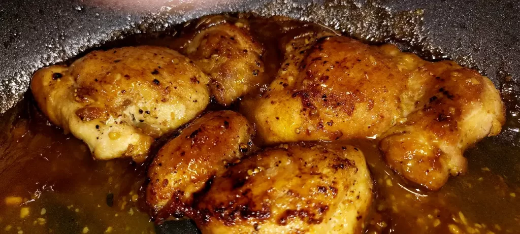 close-up-orange-butter-chicken.