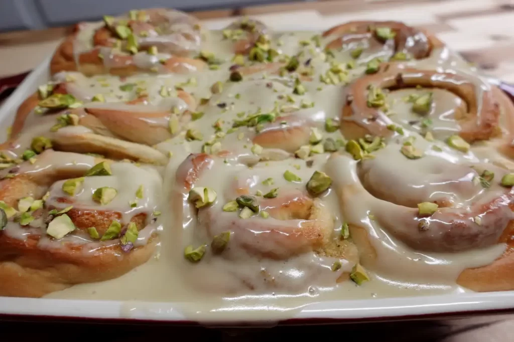 full-pan-of-pistachio-cream-rolls-close-up