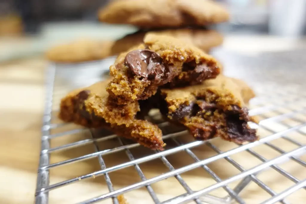 close-up-biscoff-butter-chocolate-chip-cookie-broken-in-half.