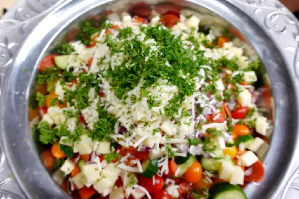 top-view-loaded-italian-pasta-salad-before-it-is-mixed.