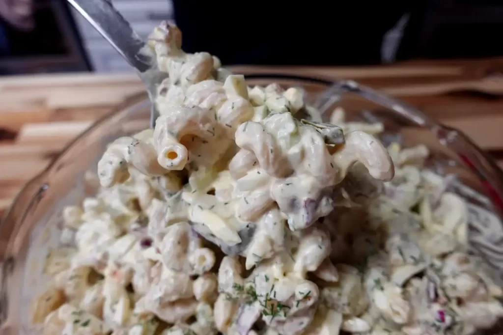 big-dill-pasta-salad-with-serving-being-spooned-out
