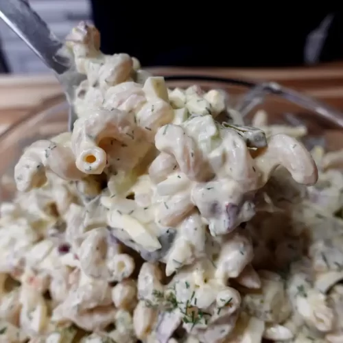 big-dill-pasta-salad-with-serving-being-spooned-out
