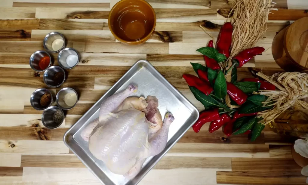 top-view-whole-chicken-and-ingredients-for-sweet-onion-ginger-beer-chicken