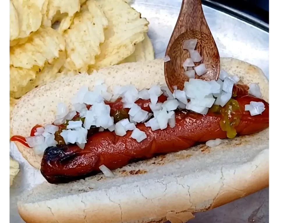 topping-marinated-hot-dogs-with-onion-and-relish