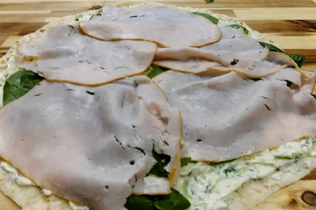 spinach-and-turkey-layered-on-cucumber-spread-on-turkey-cucumber-dill-pinwheels
