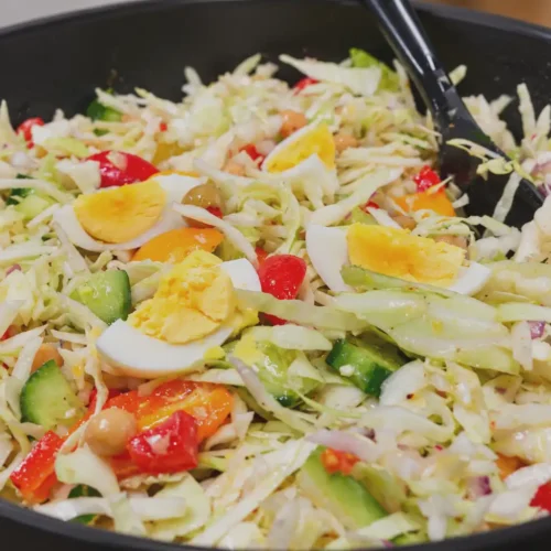 Vibrant-Mediterranean-Chopped-Salad-close-up-shot-in-black-bowl